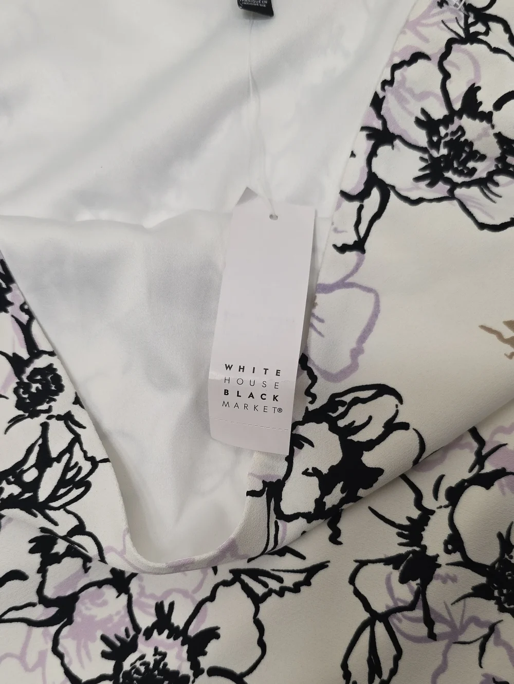 White House Black Market- Asymmetrical Floral Skirt. Size 14 . NWT